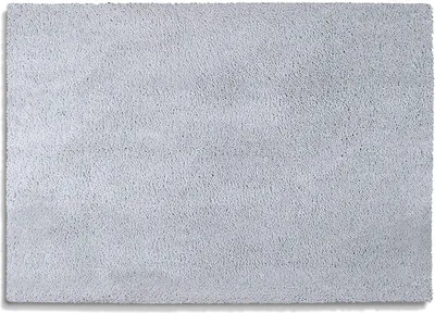 A close-up, top-down view of a rectangular, light gray bath mat with a soft, plush texture.