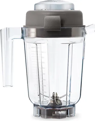 A Vitamix blender container with lid and tamper.