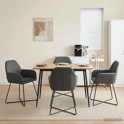 Imagen del producto de Juego de 4 sillas para comedor, tapizadas en terciopelo color gris oscuro, con dimensiones de 55x50x84 cm, con estructura de metal y acolchado de espuma, ideales para comedor y cocina
