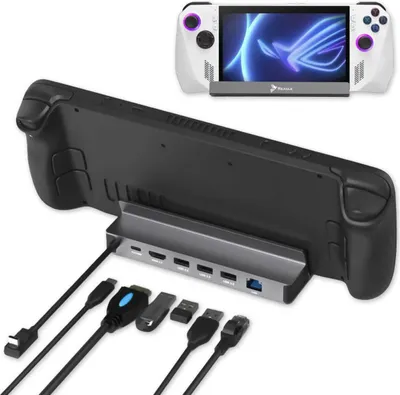 A handheld gaming device and its docking station are displayed against a white background.