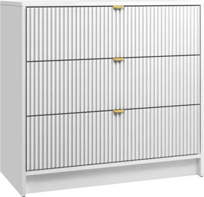 A white dresser with three drawers and gold handles.
