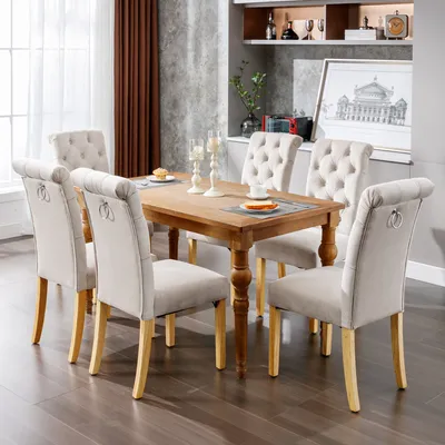 A dining room set with a wooden table and six upholstered chairs.