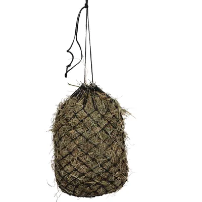 A hay net filled with hay, suspended by a rope.