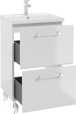 A white bathroom vanity with a sink and faucet, showing two open drawers.