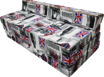 A folded sofa bed with a London-themed print.