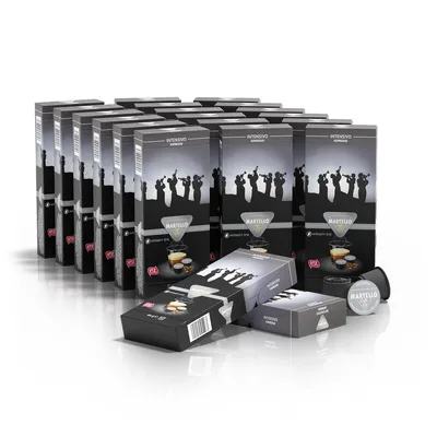 A collection of coffee capsule boxes arranged in rows, with a few individual boxes and capsules in the foreground.
