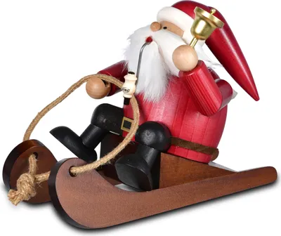 Zdjęcie produktu dla Figurka Świętego Mikołaja w czerwonym płaszczu, z fajką i dzwoneczkami na saniach, szer. x wys. x gł. 13 x 22 x 16 cm, NOWA