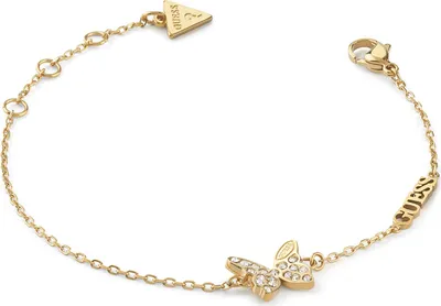 A close-up studio shot of a gold-colored bracelet with a butterfly charm.