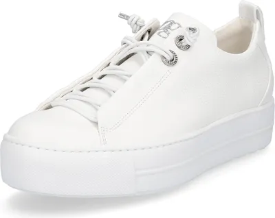 A white women's platform sneaker is shown from a side angle against a white background.