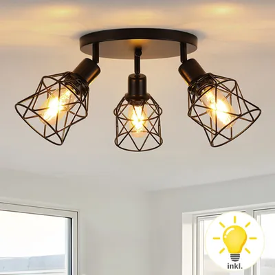 A black ceiling light fixture with three adjustable spotlights, each with a cage-like shade, mounted on a ceiling.