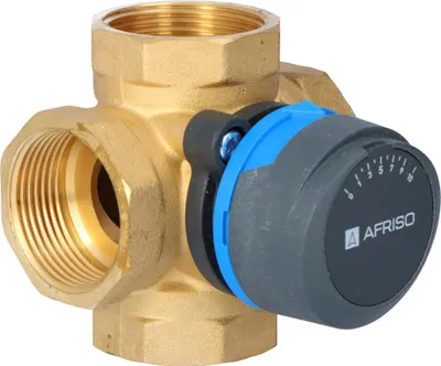 Close-up of a brass mixing valve with a black and blue adjustment knob.