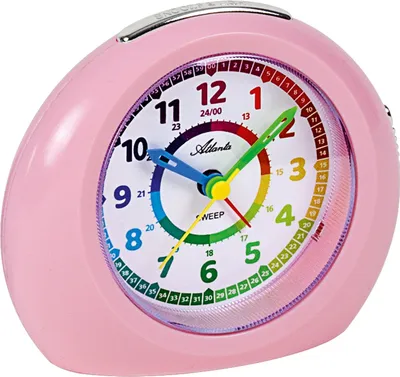 A pink analog alarm clock with a colorful dial.