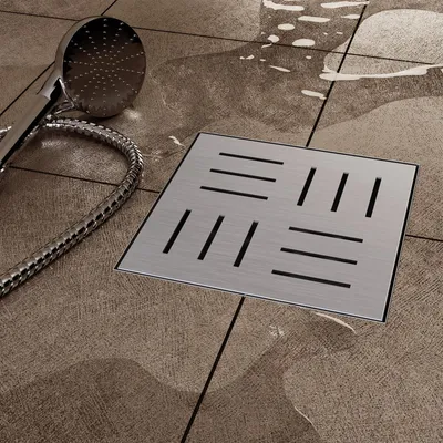 Immagine prodotto di VILSTEIN canale per doccia in acciaio inox I quadrato I scarico a pavimento I extra piatto I incl. sifone con dispositivo antiodore - fessure 15x15 cm