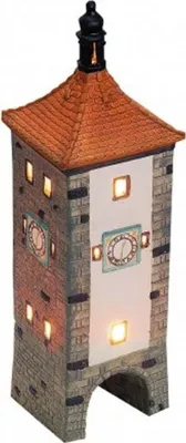 A miniature, illuminated clock tower model.