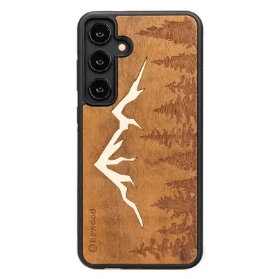 A wooden phone case with a mountain and forest design.