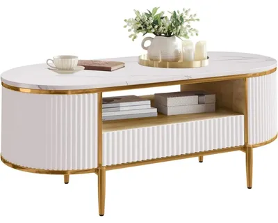 Image de Table basse moderne - Table basse ovale de 120 cm - Plateau imitation marbre - Façade à rainures - Tiroirs avec espace de rangement - Structure en bambou - Pieds en métal doré - Blanc