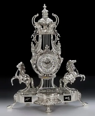 Immagine prodotto di Casa Padrino orologio da tavolo barocco argento / nero 43 x h. 54 cm - Orologio in bronzo in stile barocco fatto a mano - Orologio da tavolo barocco - Decorazione da tavolo barocca - Accessori per la decorazione barocca