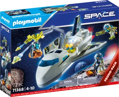 A Playmobil space shuttle toy set on its packaging, with a starry background and planets.