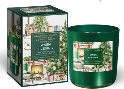 A scented candle and its packaging, both featuring a Christmas-themed illustration.