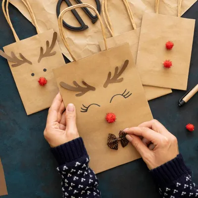 Produktbild von Papiertüten mit Griff - Geschenktüten - 30 Stück - Braun - 15 x 8 x 21 cm