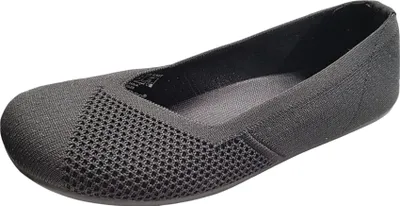 A single black ballet flat shoe is shown from a diagonal, slightly elevated angle against a white background.