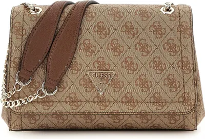 A close-up studio shot of a Guess handbag.
