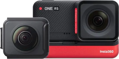 A product shot of two Insta360 ONE RS camera modules, one with a wide-angle lens and the other with a standard lens, displayed side-by-side on a white background.