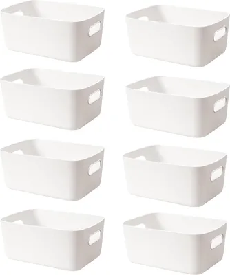 Eight white storage bins are arranged in a grid formation against a white background.