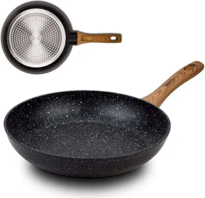 A frying pan with a wooden handle, shown from a side angle, with a smaller view of its base at the top.