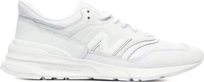 A white New Balance sneaker is shown from the side against a white background.