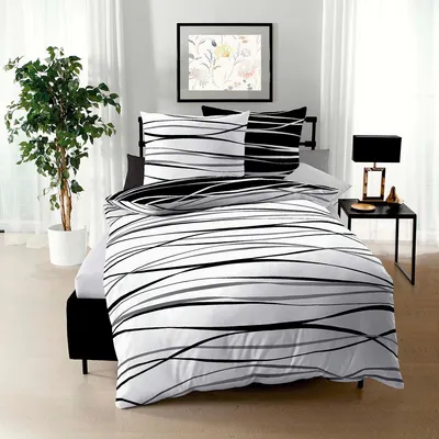 Produktbild von Traumschlaf Mako-Satin Bettwäsche Motion 155x220 cm + 80x80 cm schwarz