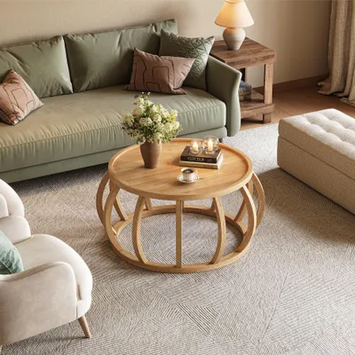 A living room scene with a couch, coffee table, and armchair.