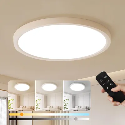 A modern, round LED ceiling light is shown mounted on a light-colored ceiling. Below the main image, three smaller images demonstrate different color temperatures of the light in a room setting, along with a slider bar indicating color temperature adjustme