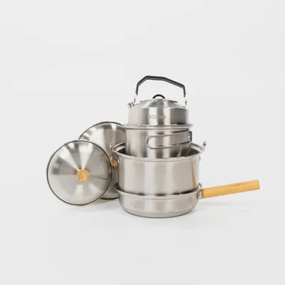 Imagen del producto de Juego de ollas y sartenes de acero inoxidable, de 6 piezas, que incluye una sartén y una tetera, ideal para cocinar en campamentos