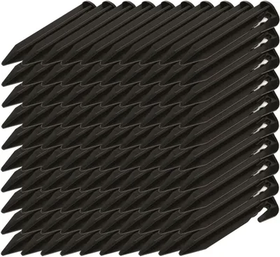 A stack of black garden stakes.