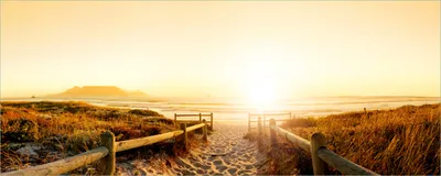 Produktbild von Wallario Poster - Strand in Südafrika II - Himmel in orange, Kunstdruck Größe: 80 x 200 cm