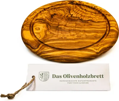 A wooden cutting board with a groove for juice, shown on a white background with a product tag.