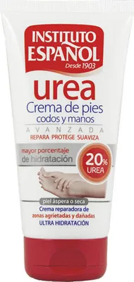 A close-up studio shot of a white squeeze tube of hand and foot cream with red and blue branding.