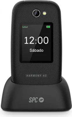 A black flip phone with a charging dock is shown against a white background.