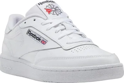 A studio shot of a single white Reebok Club C 85 sneaker.