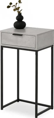 A narrow console table with a drawer and a black metal frame, topped with a black vase and a small plant.