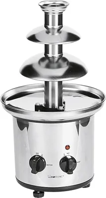 A close-up, studio shot of a stainless steel chocolate fountain.