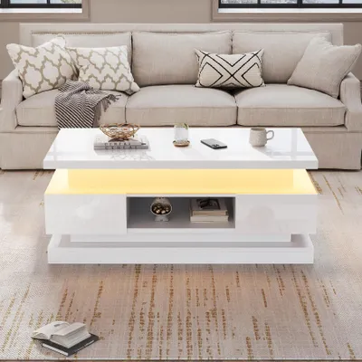 Zdjęcie produktu dla Stolik kawowy o wymiarach 100 x 50 x 40 cm, wykonany w 100% z płyty wiórowej, kolor biały, z regulowaną wysokością, wyposażony w 2 szuflady, ukrytą przestrzeń do przechowywania oraz oświetlenie LED