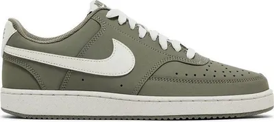 A side view of a single Nike Court Vision Lo sneaker.