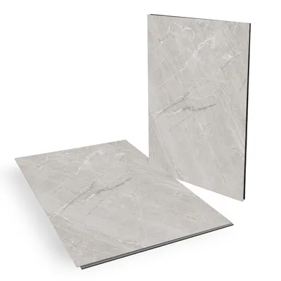 Two vinyl flooring tiles with a stone pattern, one lying flat and the other standing upright.