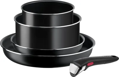 A set of black pots and pans with a detachable handle, neatly stacked against a white background.