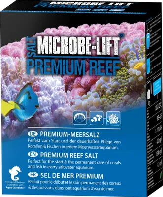 A product box for aquarium salt, featuring an image of a coral reef and a fish.
