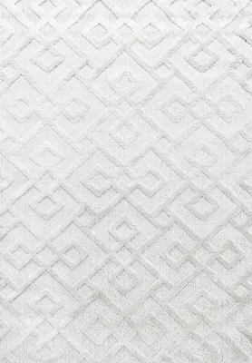 A close-up view of a white textured rug with a geometric diamond pattern.