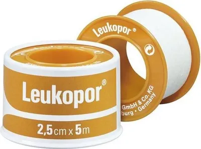 Two rolls of medical tape are shown, one in the foreground and one in the background.