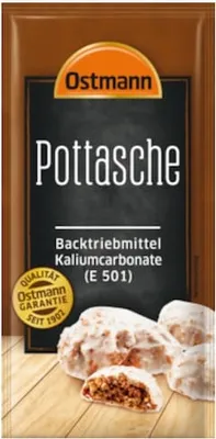 A package of Ostmann Pottasche baking powder, with an image of baked goods on the bottom.